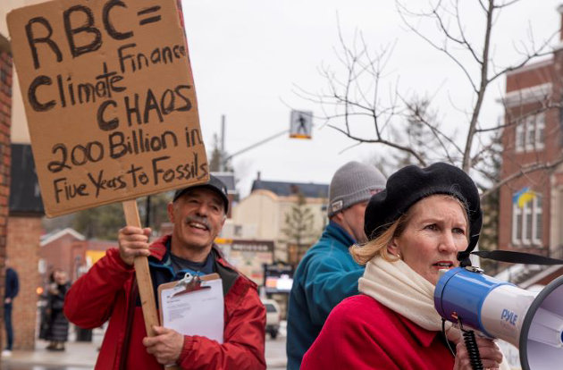 Climate Action Muskoka protests outside Huntsville’s RBC branch