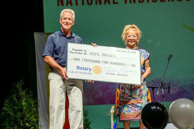 Hope Arises Project Inc. accepts a donation from Rotary
