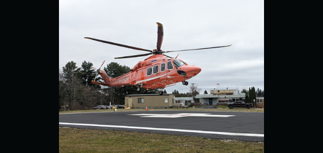 Woman pinned under unattended vehicle, airlifted to Toronto