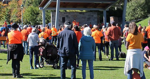 Honouring residential school survivors with flag raising, Orange Shirt Day gathering and film