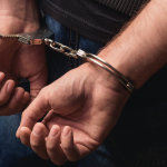 Man arrested for firearm violations and social media posts threatening public employees